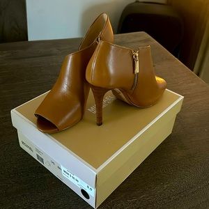 Brand new Michael Kors heels! Comes with box. Never worn.